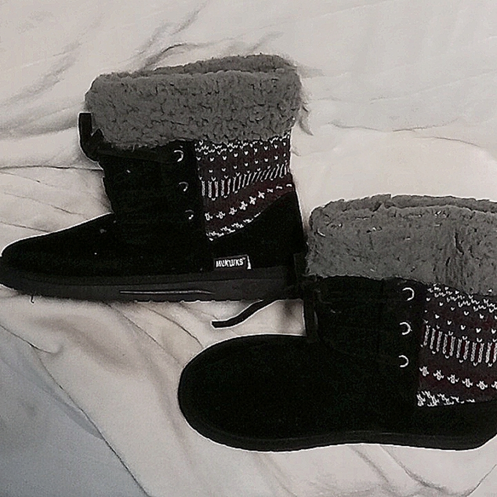 Lightly  used black with Grey fur mukluks woman size 9